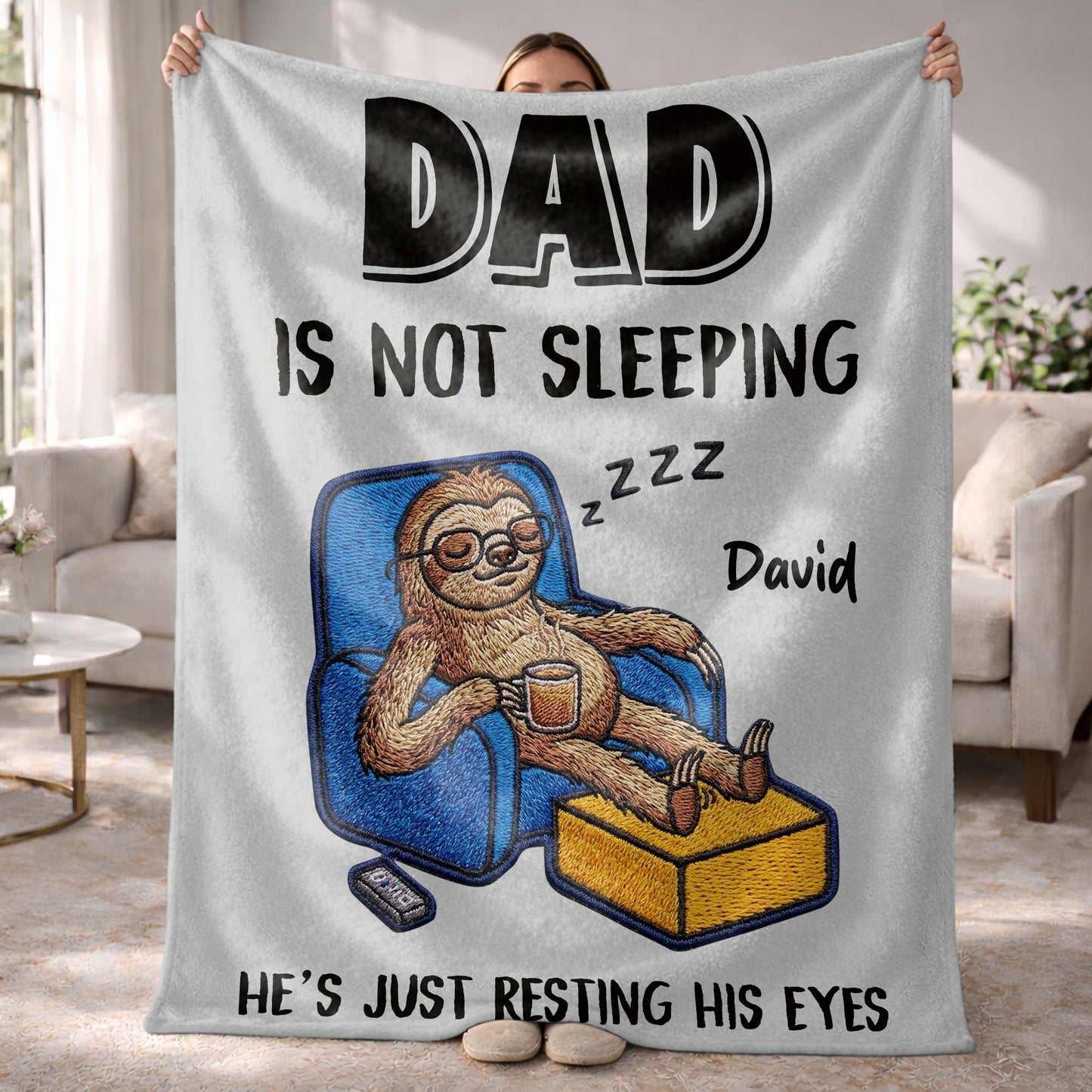 Personalized Dad Is Not Sleeping blanket with custom name, featuring a funny sloth resting its eyes in an armchair