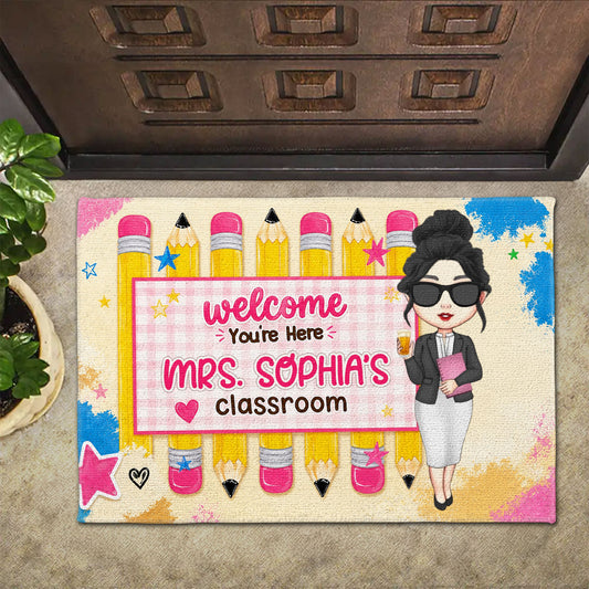Personalized teacher doormat featuring colorful pencils and a custom teacher character for a classroom welcome mat