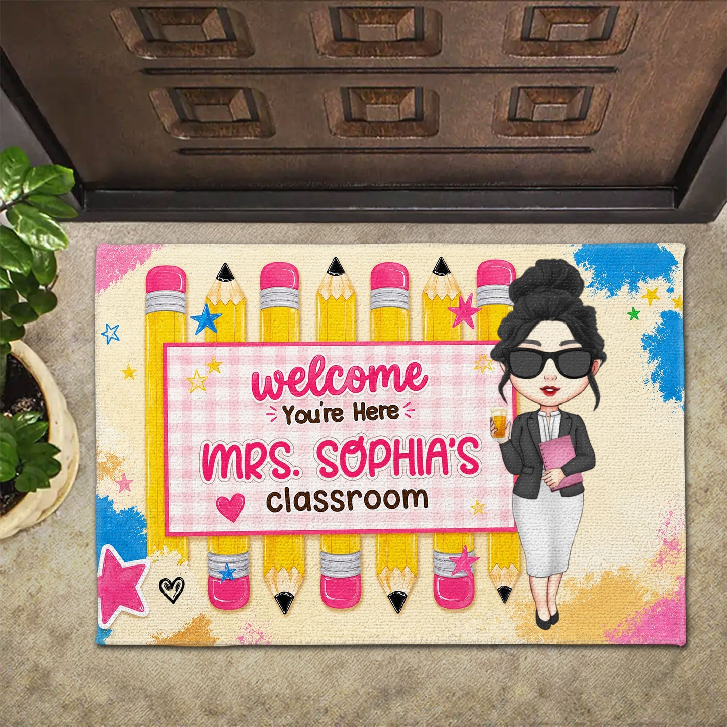 Personalized teacher doormat featuring colorful pencils and a custom teacher character for a classroom welcome mat