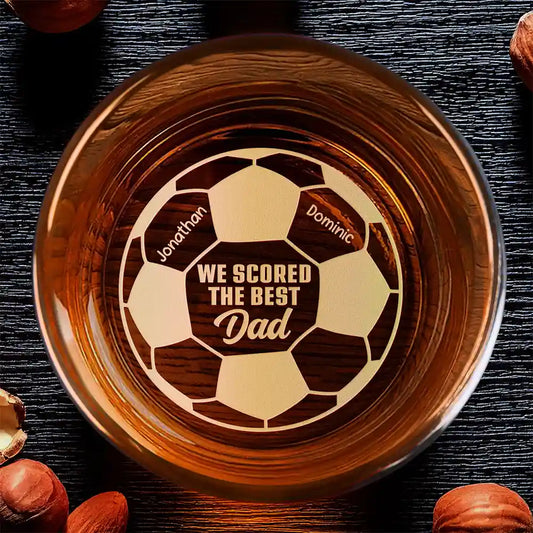 Personalized soccer dad whiskey glass engraved with custom kids names on a football design, unique gift for fathers
