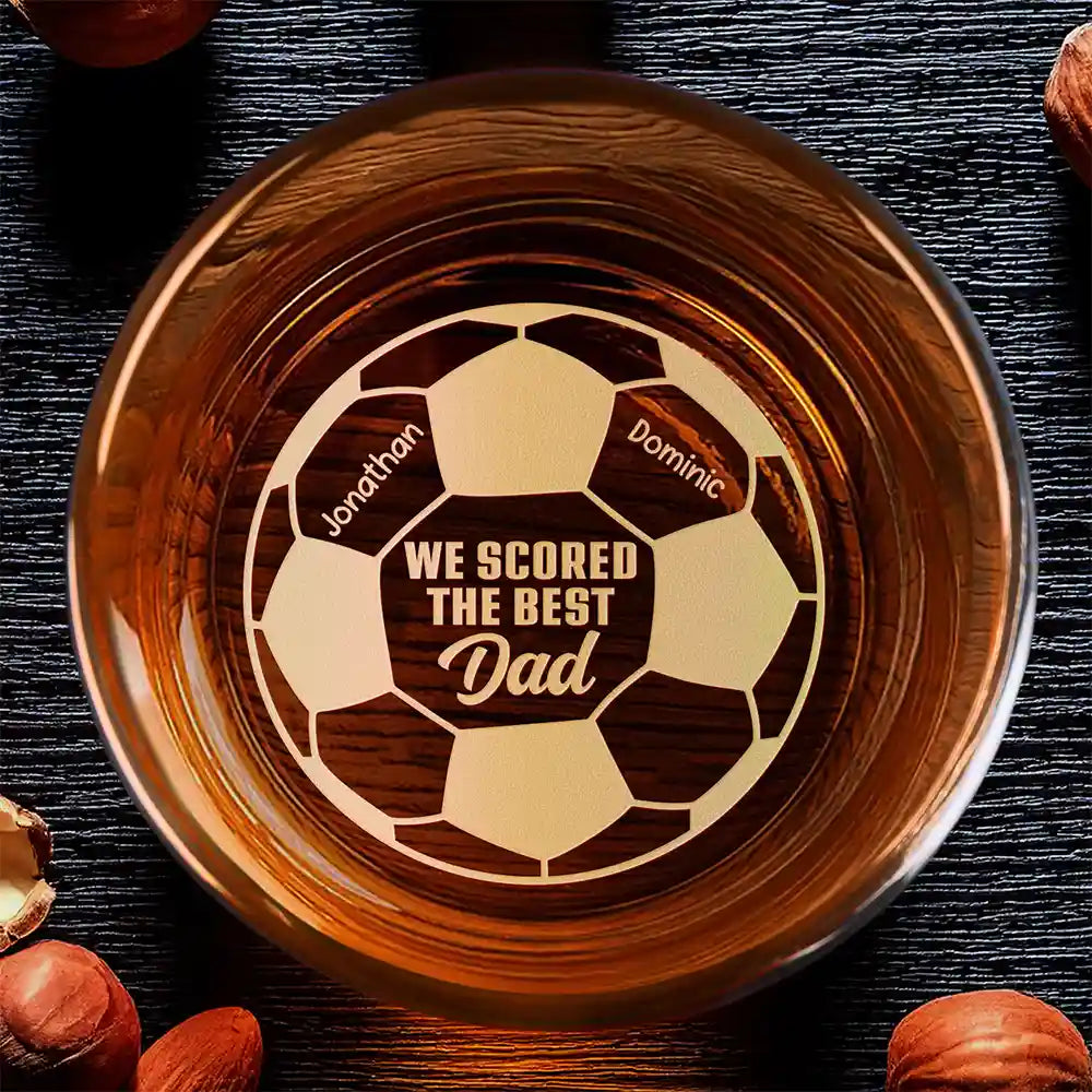 Personalized soccer dad whiskey glass engraved with custom kids names on a football design, unique gift for fathers