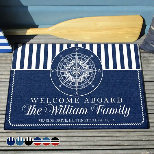 Personalized beach house doormat with custom family name and nautical compass design