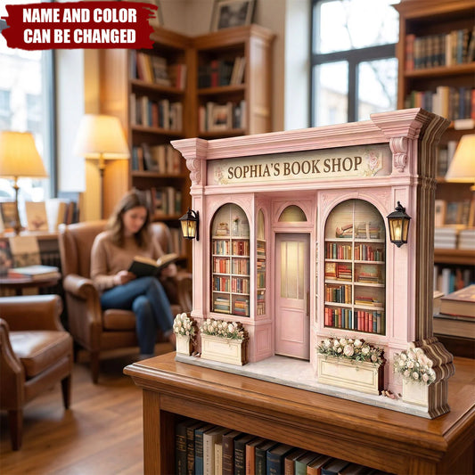 Personalized bookshop wooden block plaque with custom name on a cozy library table