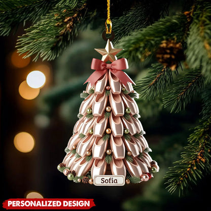 Personalized ballet ornament shaped like a Christmas tree made of pointe shoes with a custom name slot