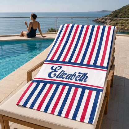 Personalized patriotic beach towel with custom name David featuring red and blue stars and stripes design by a pool image 6