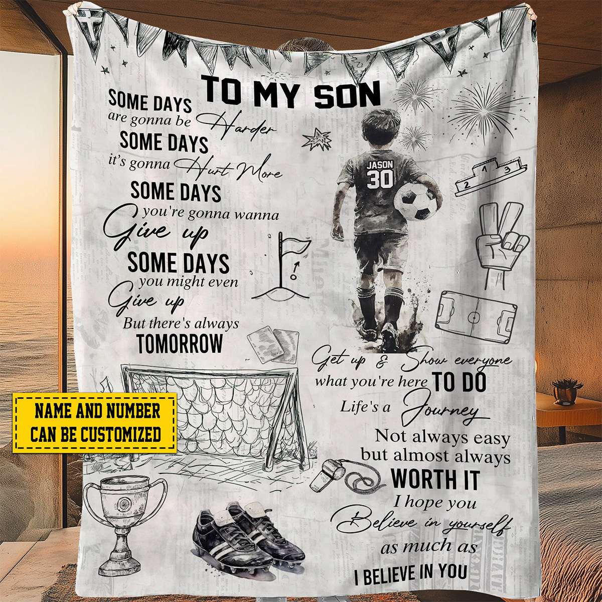 Personalized soccer blanket for boys featuring a custom name and jersey number next to an inspiring sports quote.