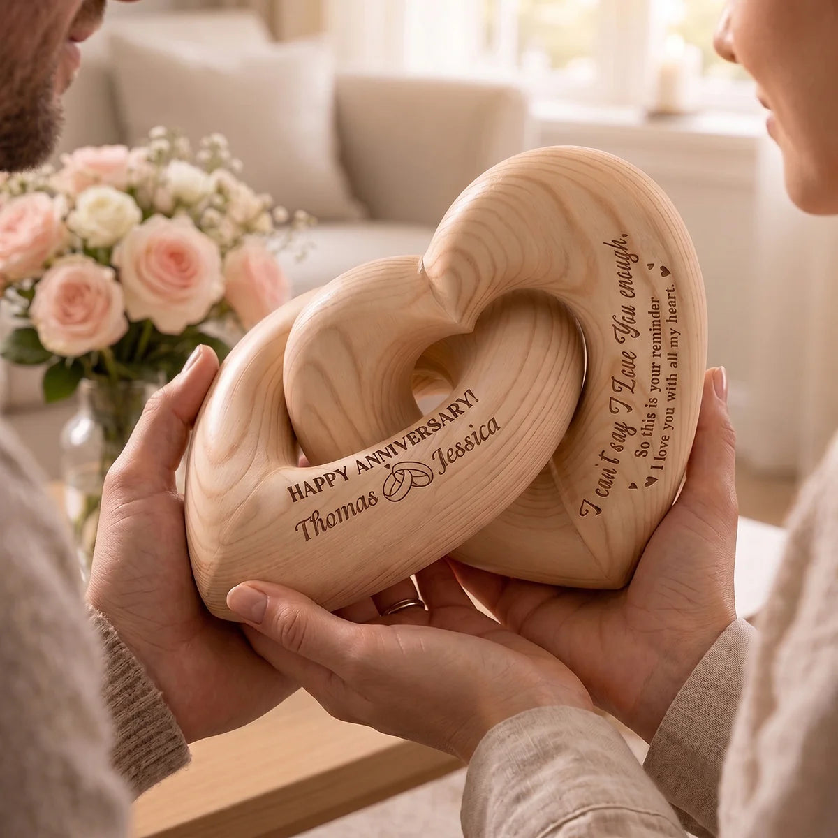 Personalized interlocking wooden heart sculpture with custom anniversary engraving for couples