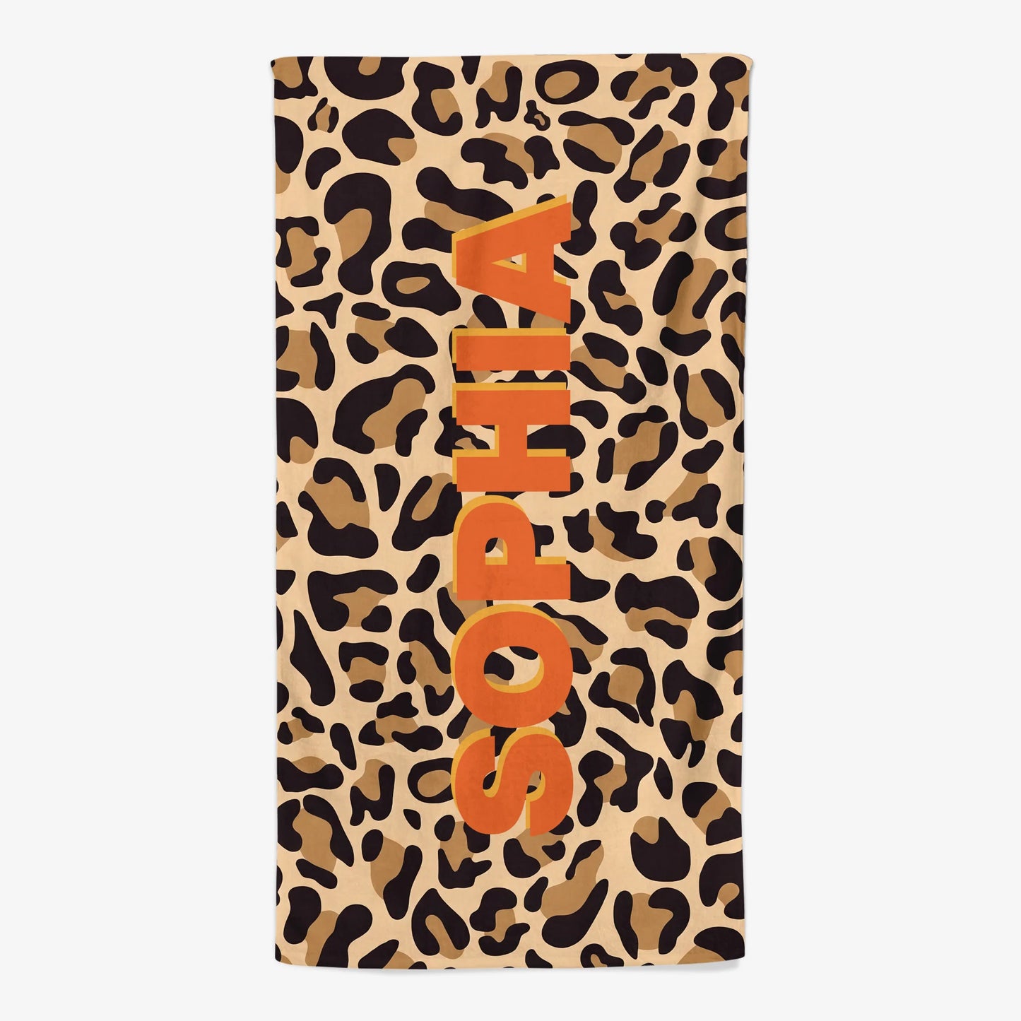 Custom monogram beach towel with personalized name over a trendy leopard print pattern