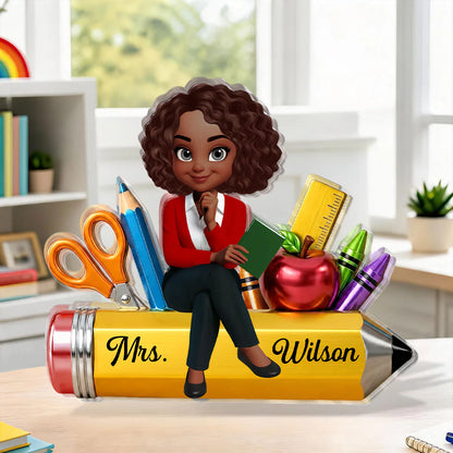 Personalized teacher acrylic plaque featuring a custom cartoon educator sitting on a pencil with school supplies