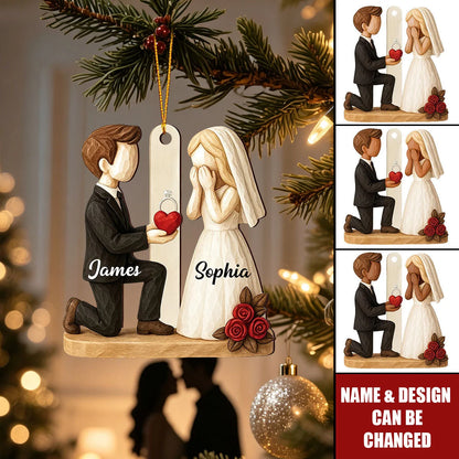 Personalized engagement ornament depicting a kneeling groom proposing to his bride, custom gift for couples