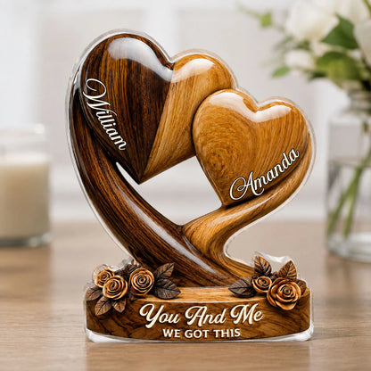 Custom couple anniversary plaque shaped like interlocking wood-textured hearts with personalized names