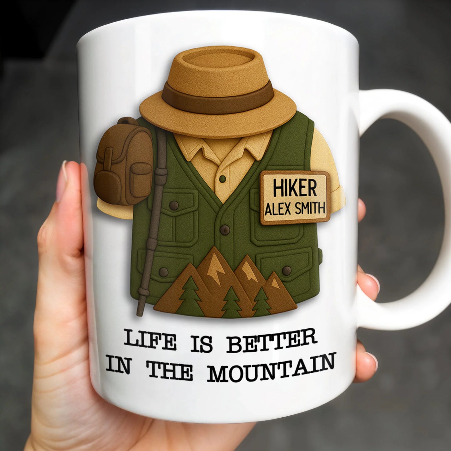 Personalized hiker coffee mug featuring a custom name tag, hiking vest design, and mountains for outdoor lovers