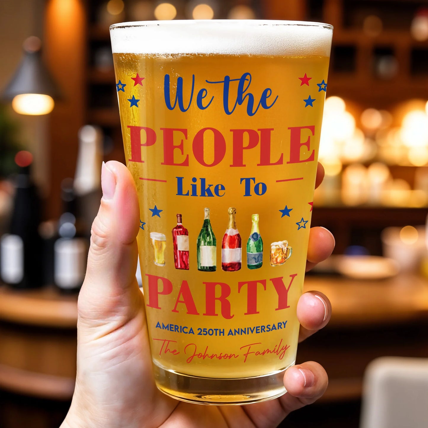 Personalized USA 250th Anniversary beer glass featuring the quote We The People Like To Party with custom family name print