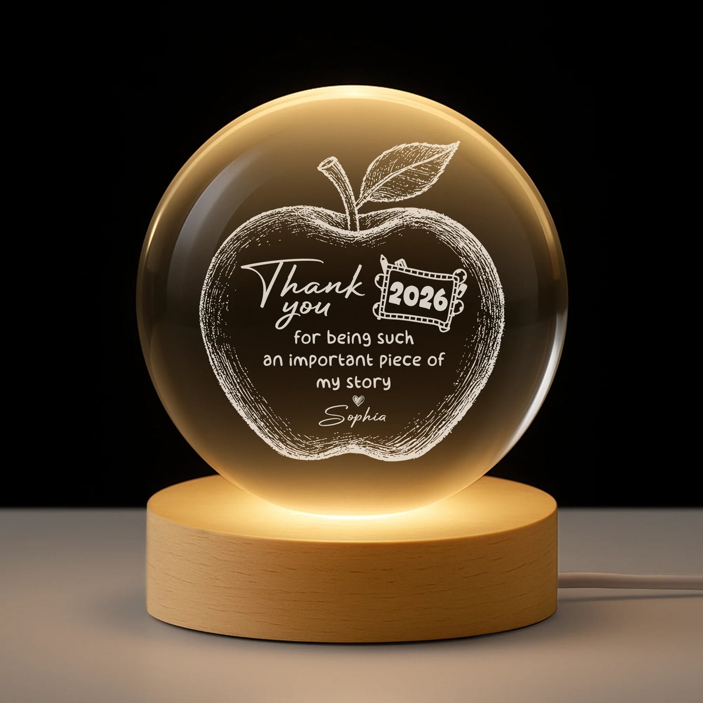 Personalized teacher appreciation crystal ball lamp with custom name and apple design engraving on a wooden LED base