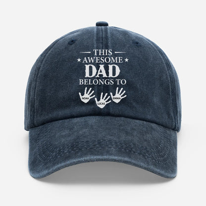 Personalized dad baseball cap in navy blue with custom handprints and kids names printed on the front