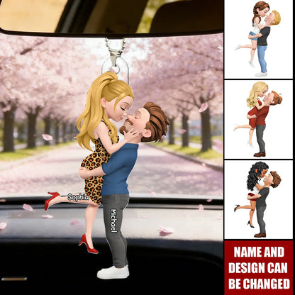 Personalized car hanger ornament showing a custom cartoon couple embracing with names Sophia and Michael.