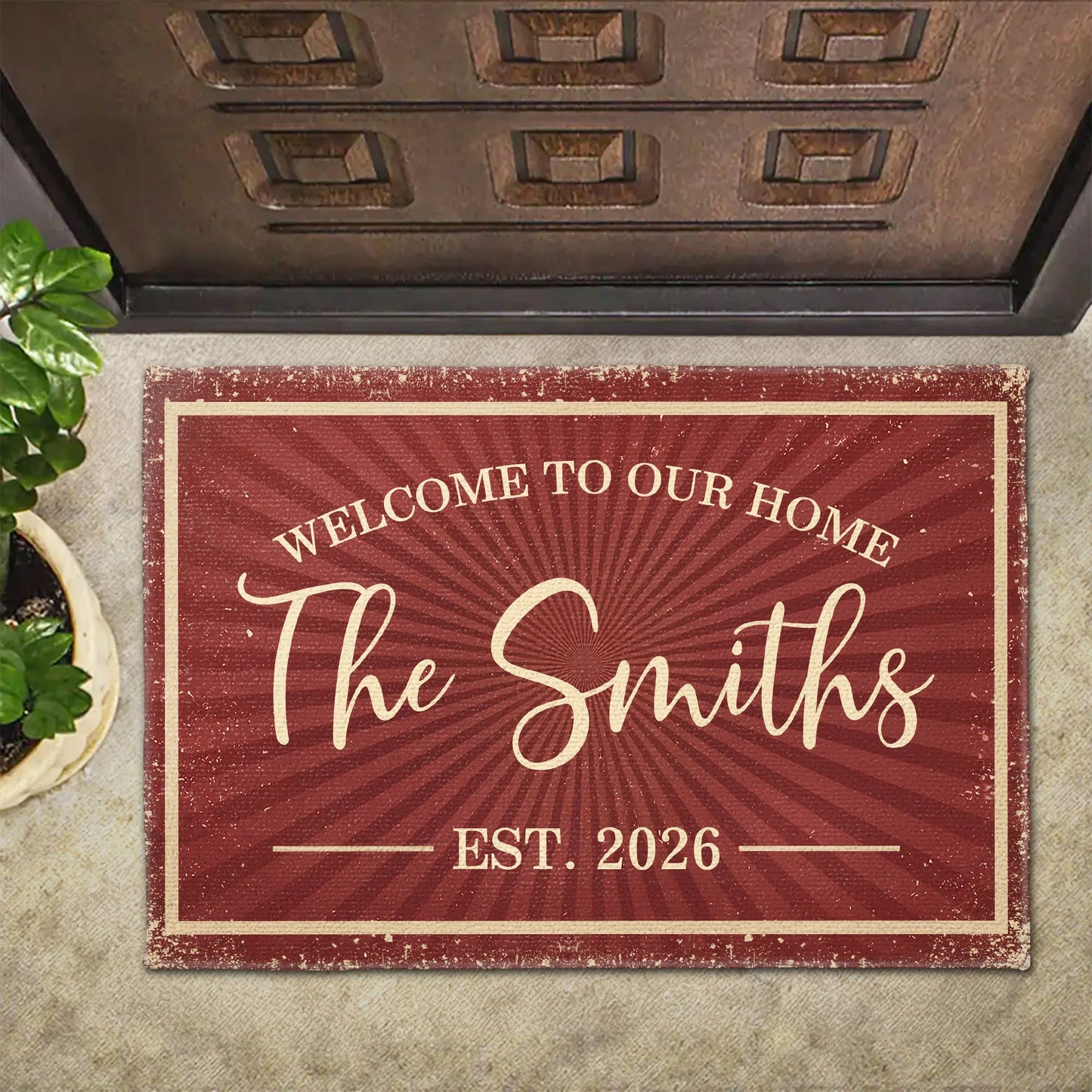 Personalized family name doormat with sunburst design for custom welcome home entry gift