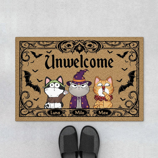 Custom Halloween cat doormat printed with Unwelcome quote and personalized cat names for entryway décor