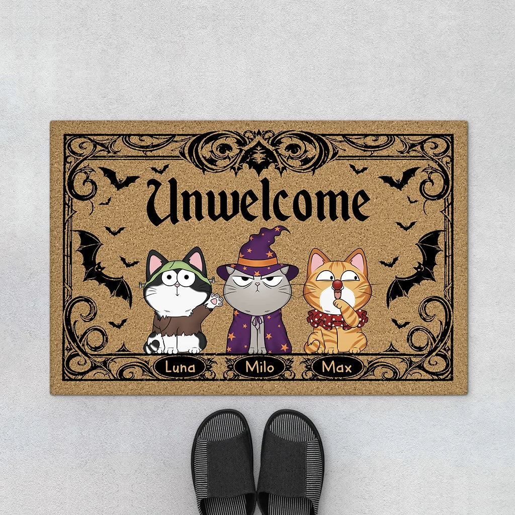 Custom Halloween cat doormat printed with Unwelcome quote and personalized cat names for entryway décor