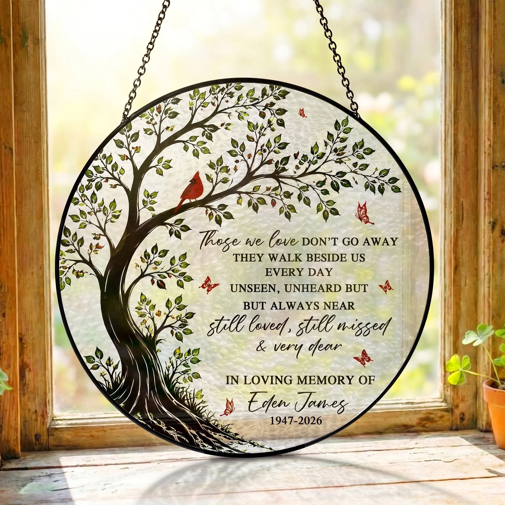 Personalized memorial suncatcher ornament featuring a red cardinal on a tree for family lost loved ones