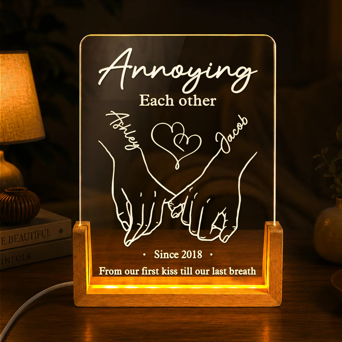 Custom anniversary night light with personalized names, holding hands art, and date on a warm wooden LED base. image 6