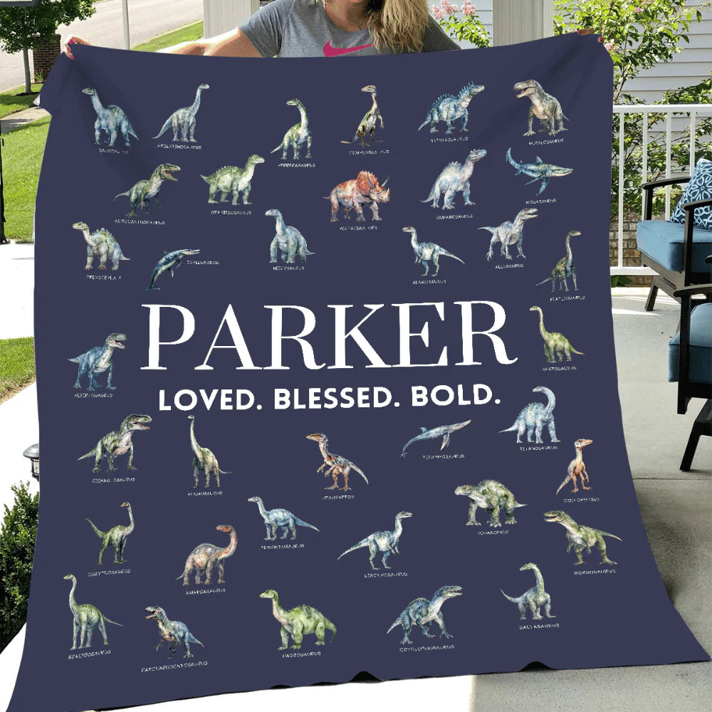 Personalized kids dinosaur blanket with watercolor dino illustrations and custom name text