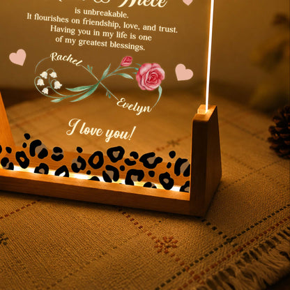 Personalized aunt and niece night light with custom birth flowers and leopard print on a warm LED wooden base image 7