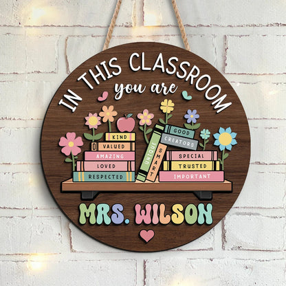 Custom teacher door sign with a personalized name and a welcoming classroom quote on round wood