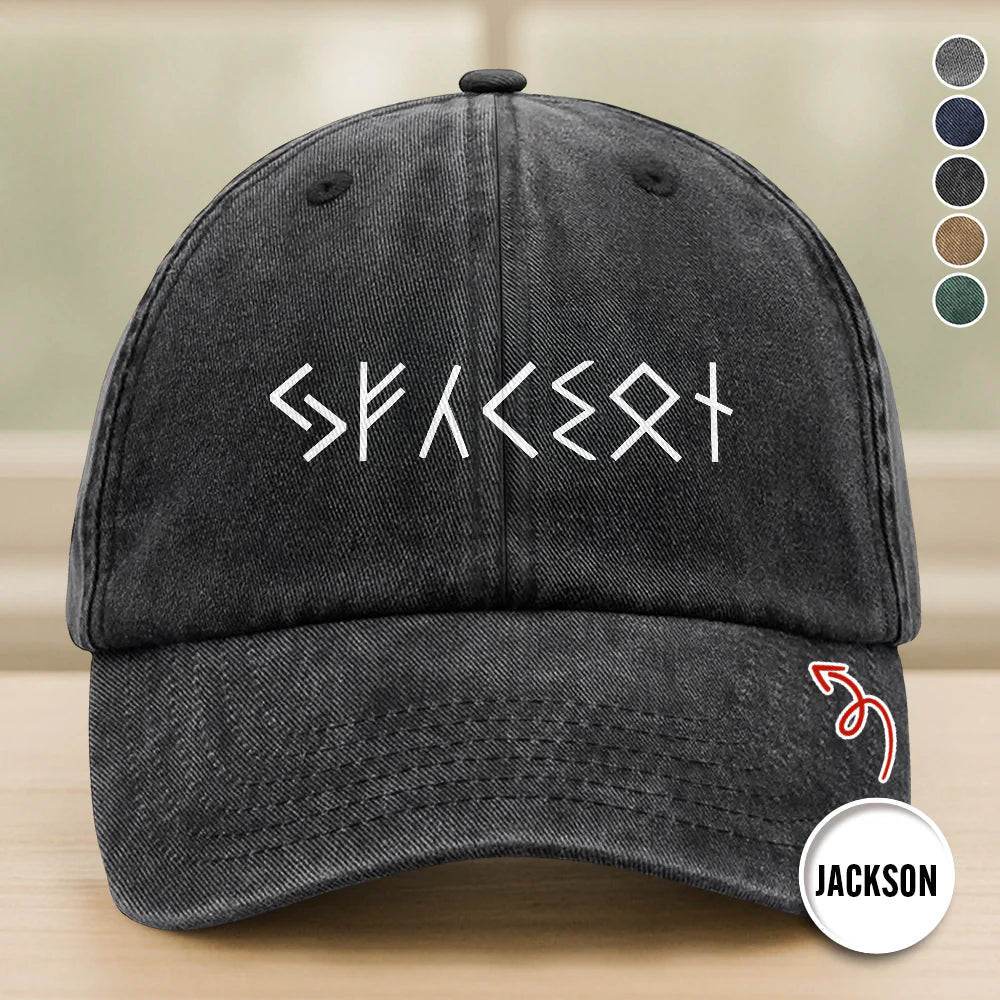 Personalized viking rune hat in black washed denim featuring custom name printed in ancient white Norse runes
