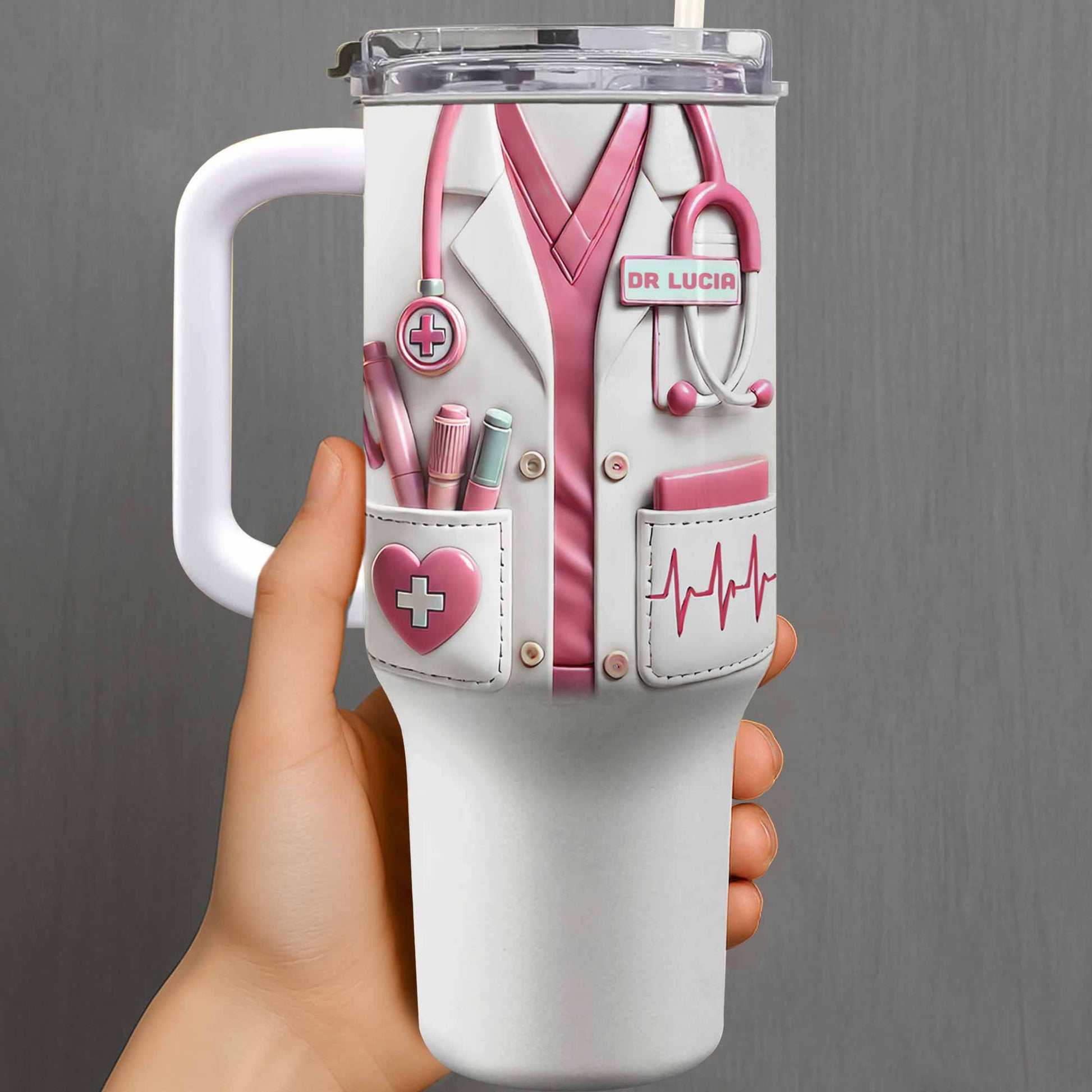 Personalized nurse 40oz tumbler featuring a custom pink medical scrubs design with stethoscope and heartbeat line.