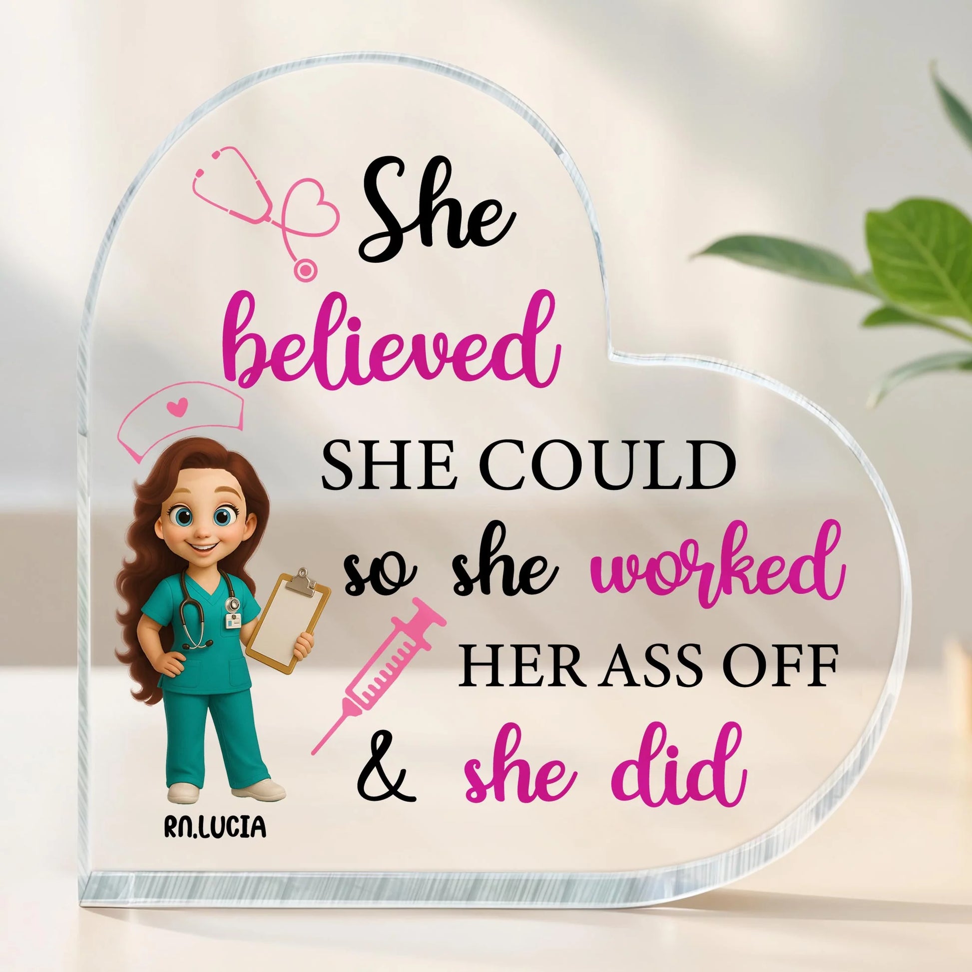 Personalized nurse acrylic plaque shaped like a heart with custom character name RN Lucia and motivational quote