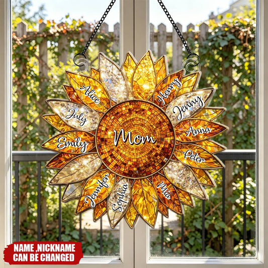Custom sunflower suncatcher acrylic ornament hanging in a window featuring personalized family names