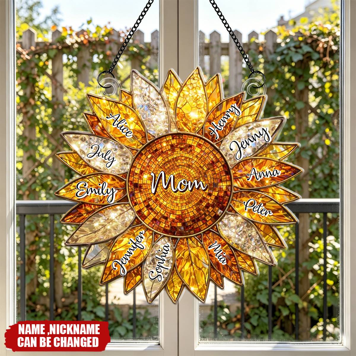 Custom sunflower suncatcher acrylic ornament hanging in a window featuring personalized family names