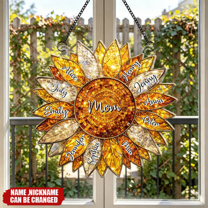 Custom sunflower suncatcher acrylic ornament hanging in a window featuring personalized family names